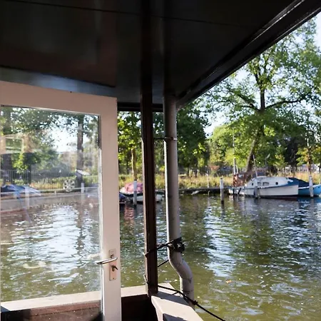Botel House Boat On One Of The Beautiful Canals *
